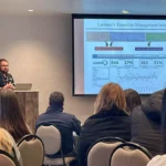 Outreach Dr. Ribeiro delivering a presentation to an audience during the Dairy at Guelph Research Showcase 2025.